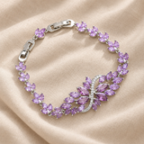 Elegante pulseira de prata com símbolo do infinito e folha