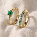 Conjunto Serena Duo de anéis de dourado com esmeralda