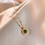 Colar elegante em dourado Dial com esmeralda