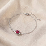 Elegante pulseira do infinito com rubi em ouro branco