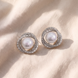 Brincos espirais elegantes adornados com pérolas