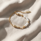 Pulseira elegante de pérolas douradas – estilo intemporal