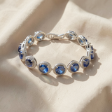 Pulseira redonda elegante com safira em prateado