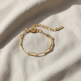 Pulseira dourada elegante em forma de clipe de papel